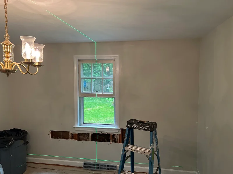 Using a laser level to find the center of the room